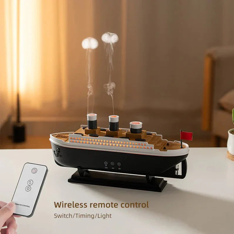 Essential Oil Diffuser with thick mist in a steamship design, featuring LED lights, on a table.