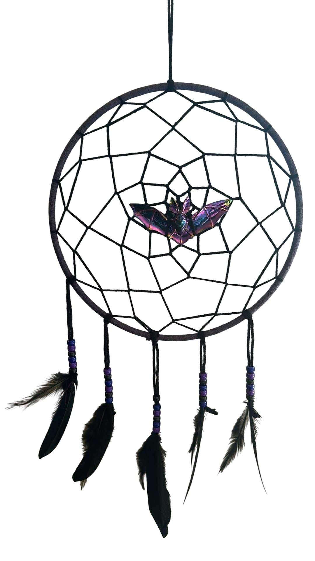 Handmade gothic dreamcatcher with black web, purple bat centerpiece, and black feathers decor