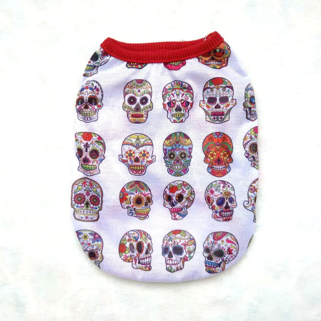 Halloween-themed pet shirt with colorful skull motifs.
