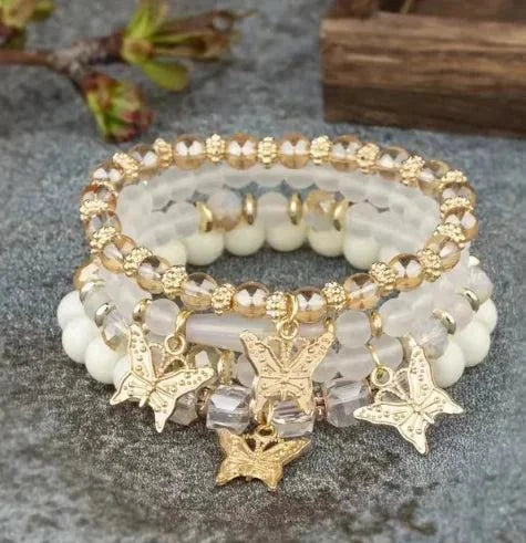 Butterfly Bliss Beaded Bracelets with butterfly charms and vibrant beads.