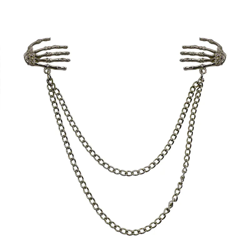 Bold Alloy Skull Claw Pin with Tassel, Electroplated Finish in Gold, Luxurious Statement Accessory.