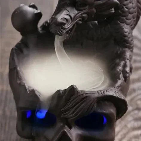 Skull Backflow Incense Burner with cascading smoke and LED glow.