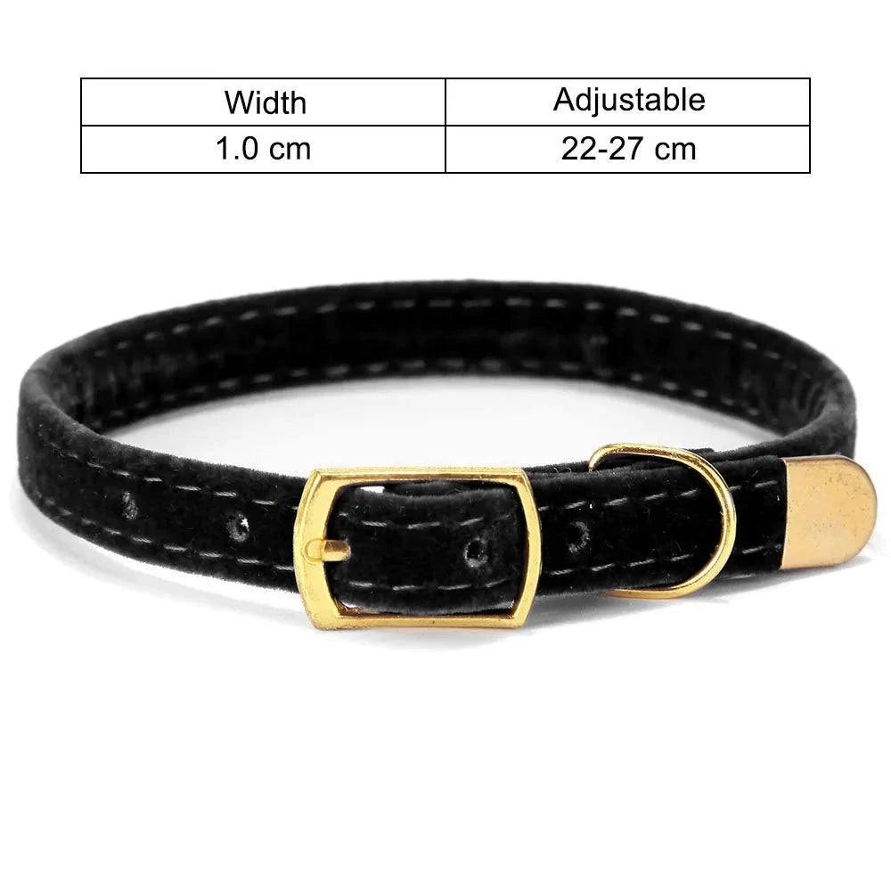Durable and stylish black cat collar with breakaway buckle, adjustable for perfect fit.