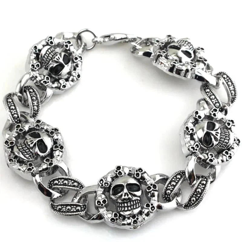 Men's bold skull metal bracelet with geometric design on a wrist.