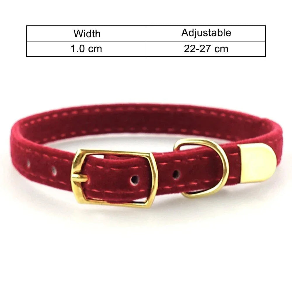 Red cat collar with breakaway buckle, adjustable fit, and durable design.