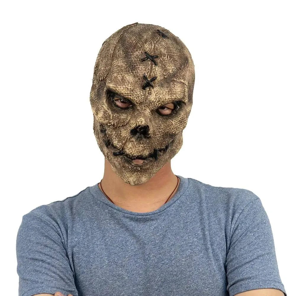 Skull mask made of high-quality latex, featuring intricate details and an eerie white hue for themed events and costumes.