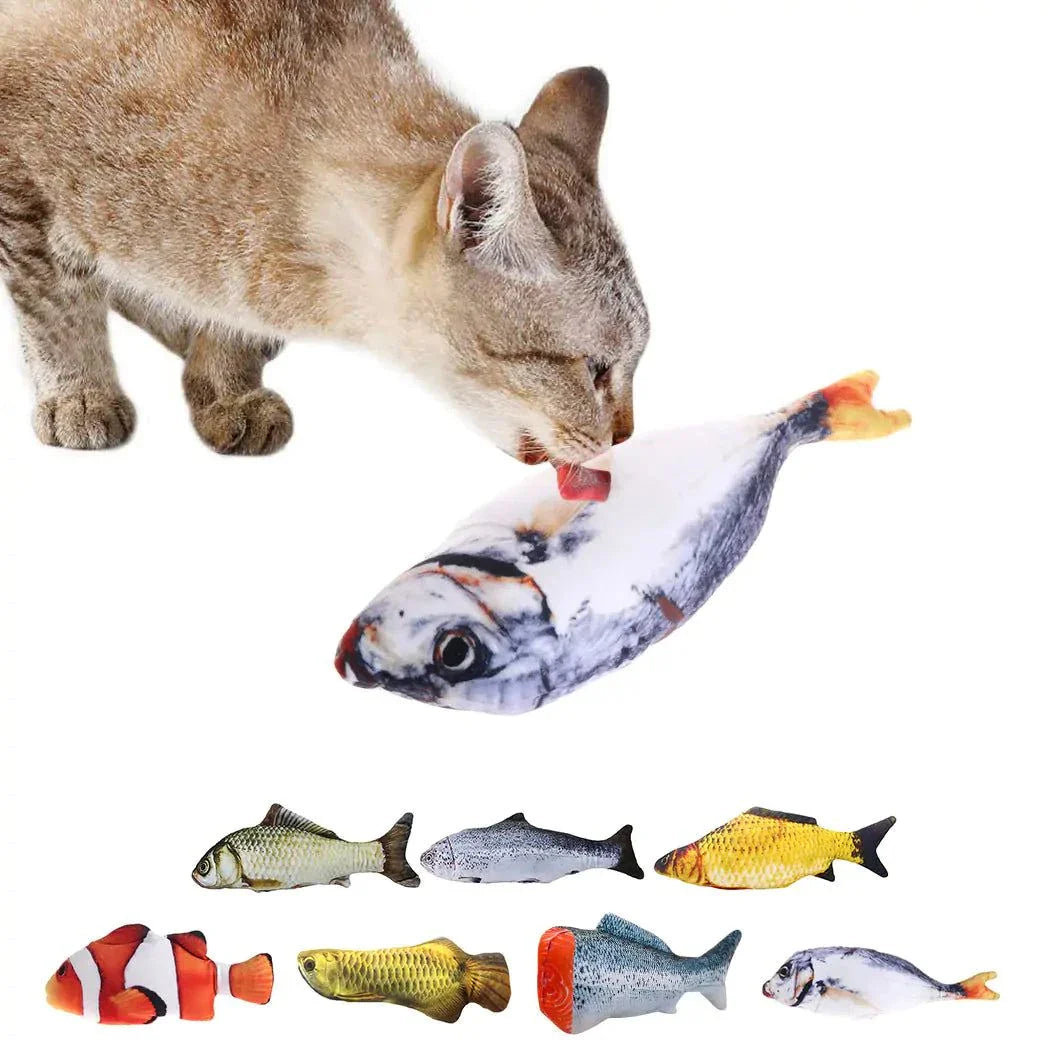 Cat playing with Creative Fish Shape Pet Toy; includes realistic fish designs and catnip for interactive fun.
