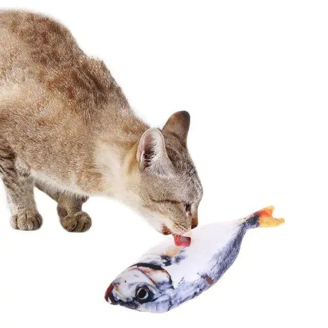 Cat playing with Creative Fish Shape Pet Toy filled with catnip.