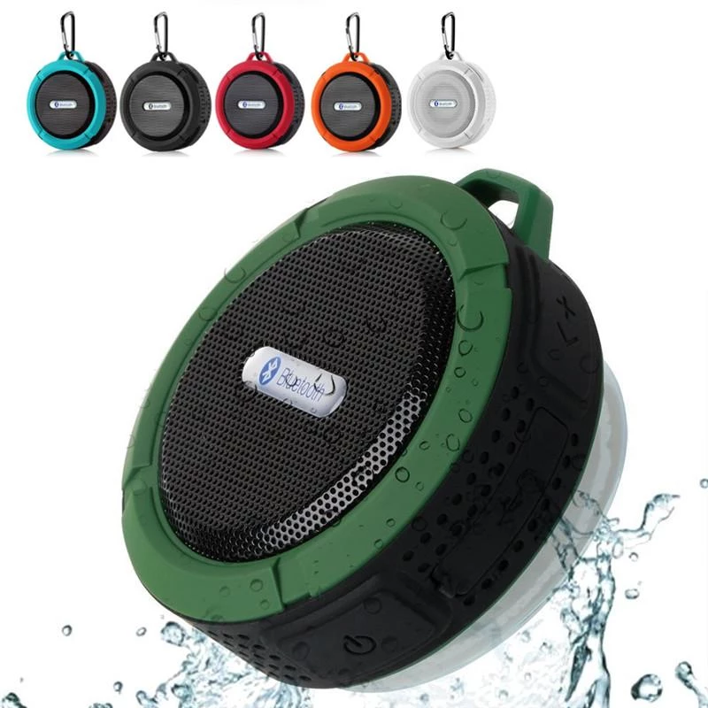 Mini portable waterproof Bluetooth speaker with suction cup, multiple colors, water splash effect.