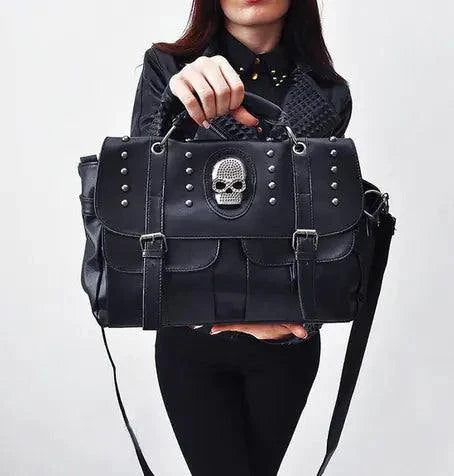 Skull handbag versatile tote bag with edgy design and studs, held by person.
