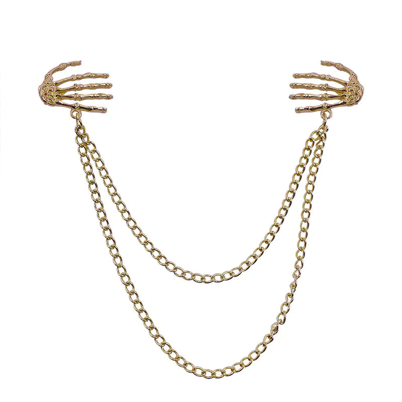 Bold Alloy Skull Claw Pin with Tassel, Electroplated Finish in Gold, Luxurious Statement Accessory.