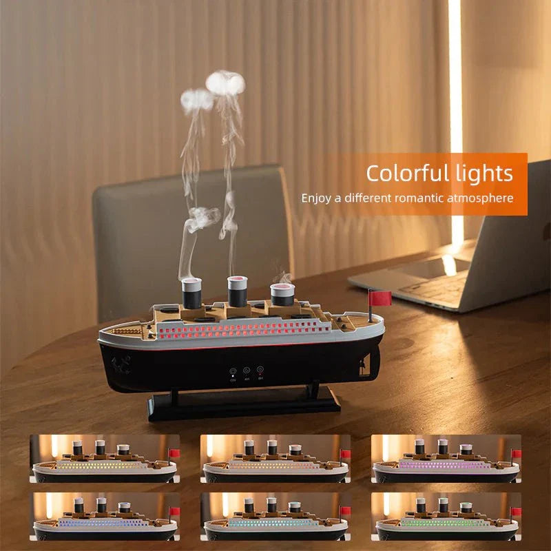 Essential Oil Diffuser with thick mist in a steamship design, featuring LED lights, on a table.