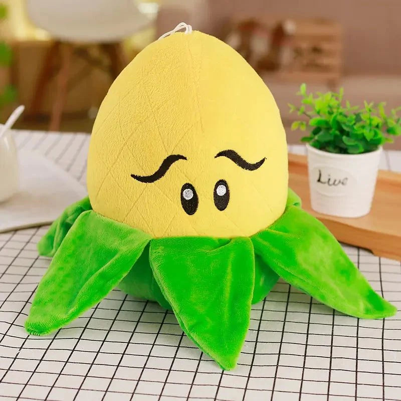 Large Plants vs. Zombies plush toy with green leaves and yellow face, on checkered surface.