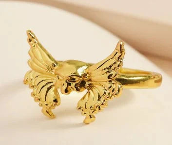Vintage Punk Butterfly Skull Ring in gold, featuring intricate butterfly and skull design, made from zinc alloy.