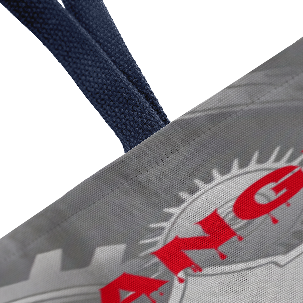Strange & Unusual Tote Bag with unique design and navy straps.