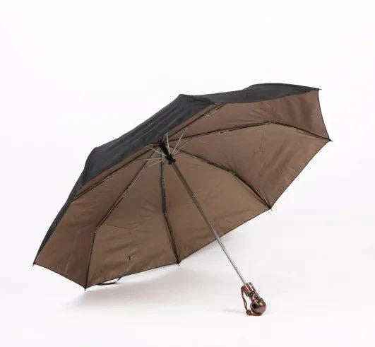 Folding umbrella with skull design, featuring durable impact cloth and alloy structure.