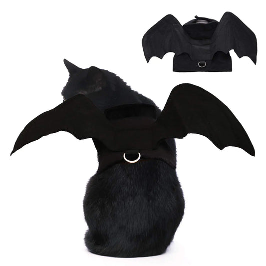 Small pet wearing ShadowBat Pet Costume with black bat wings, designed for cats and small dogs; ideal for Halloween or photo shoots.