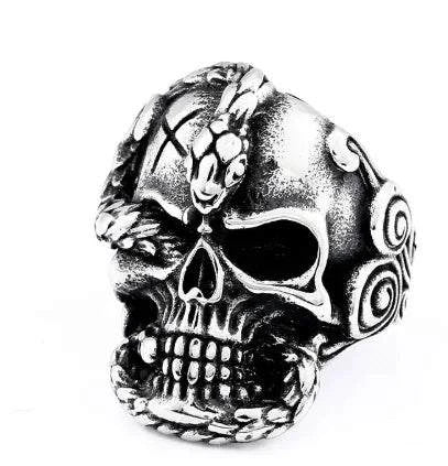 Vintage skull titanium ring in silver with intricate design.