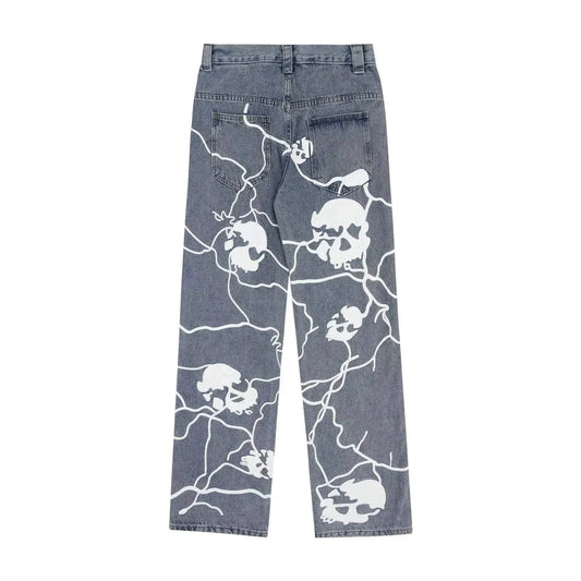 Lightning Skull Denim Trousers with skull and lightning print on washed denim.